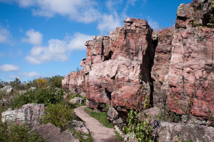 This Historic Hike At Pipestone National Monument Leads To Pink Cliffs And A Rushing Waterfall