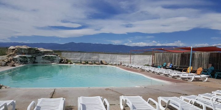 Visit Desert Reef Hot Spring, One Of Colorado's Most Underrated Springs And A Great Summer Destination