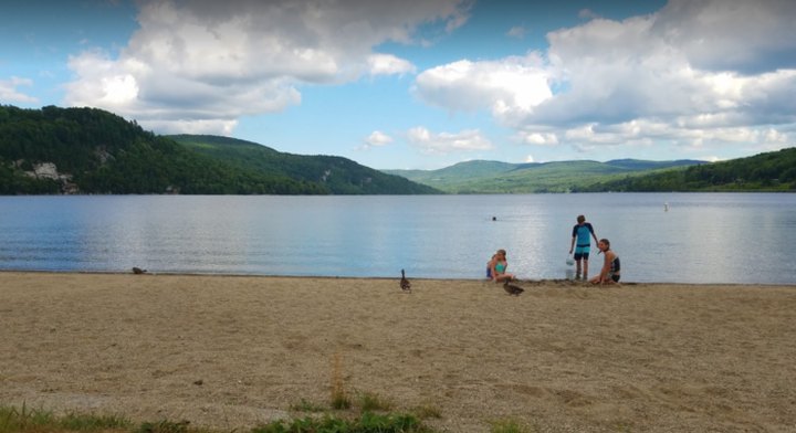 The Water Is A Brilliant Blue At Crystal Lake, A Refreshing Roadside Stop In Vermont