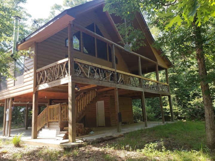 You'll Have A Front Row View Of A Mississippi Waterfall At This Cozy Cabin