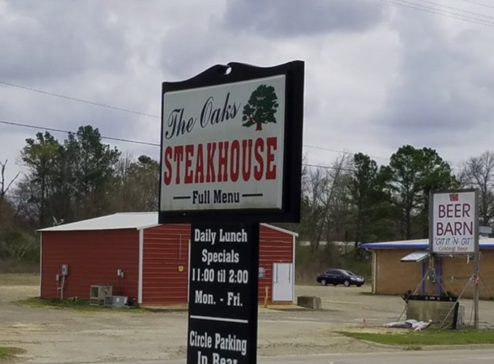 Enjoy A Mouthwatering Steak At The Oaks Steakhouse, A Charming, Rustic Restaurant In Oklahoma
