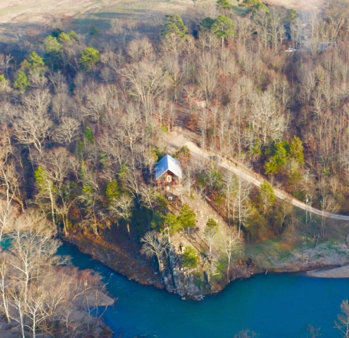 Perched Above The Caddo River, Nichols Hole Cabin Offers One Of Arkansas' Most Scenic Getaways 