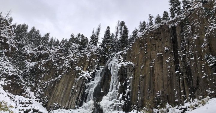 Hike To A Massive Frozen Waterfall Hiding At The Base Of Palisade Mountain In Montana