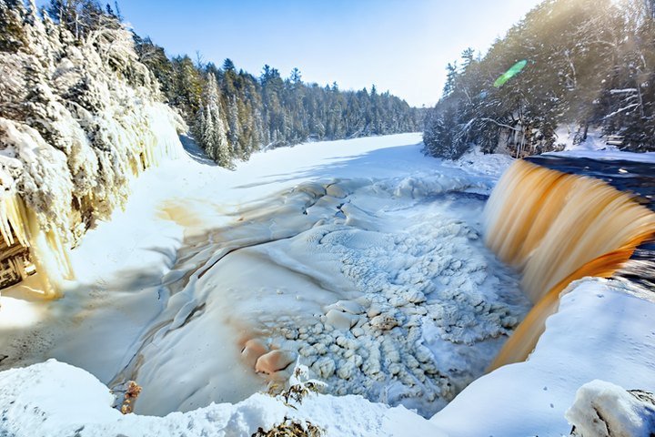 These 17 Frozen Waterfalls Across America Make Us Want To Bundle Up And Explore