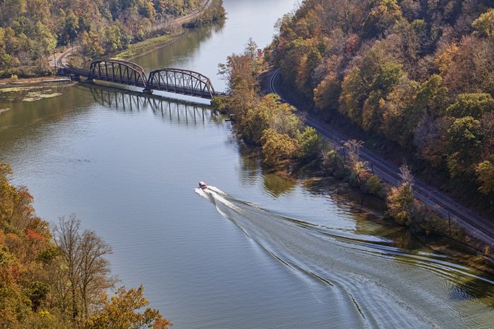 This West Virginia Jet Boat Ride Leads To The Most Stunning Fall Foliage You've Ever Seen
