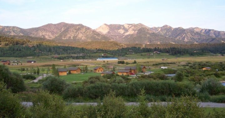 Go Horseback Riding, Then Sleep In A Cabin Surrounded By Fall Foliage On This Weekend Getaway In Wyoming