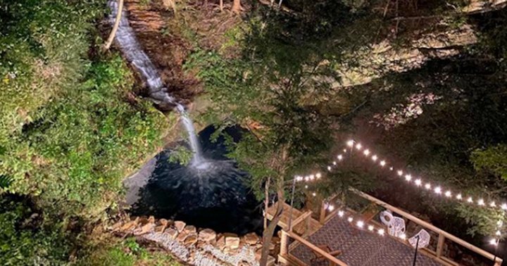 This Ohio Cabin Hiding In Hocking Hills Has A Heated Waterfall Swimming Hole