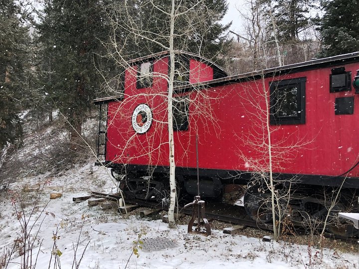 Spend The Night In A Former Train Caboose For A One-Of-A-Kind Getaway In Colorado
