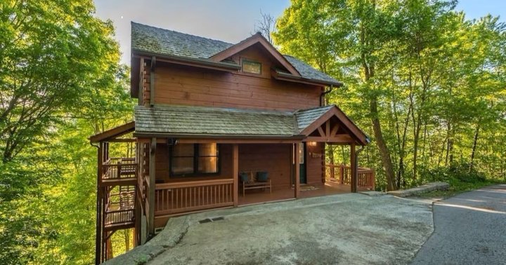 Soak In A Hot Tub Surrounded By Natural Beauty At The Epic Skybox Cabin In North Carolina