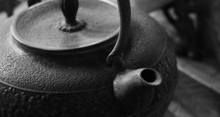 Heat water in a kettle or a pot