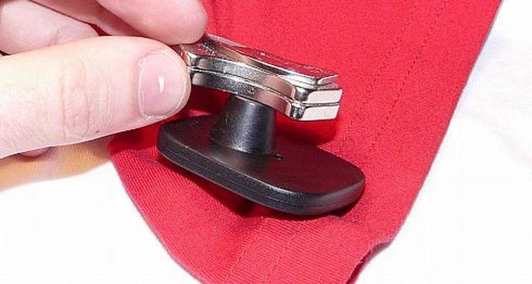 Hard drive magnet on magnetic security tag