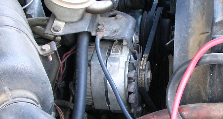 Alternator driven by a drivebelt and pulley.