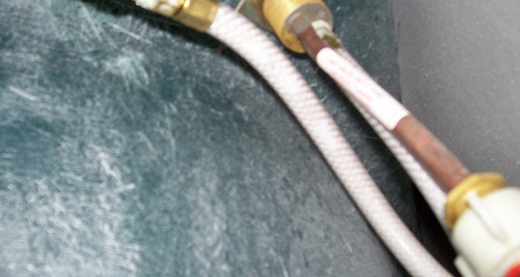 Check pressure valves, cartridges and connections on hot water (red) lines.