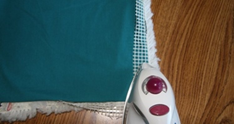 Fold and press canvas to wrong side.