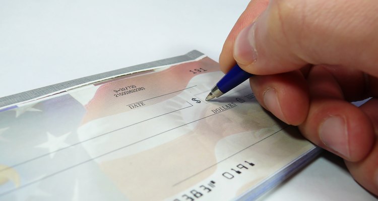Writing a Check (muresan113, http://www.sxc.hu/)