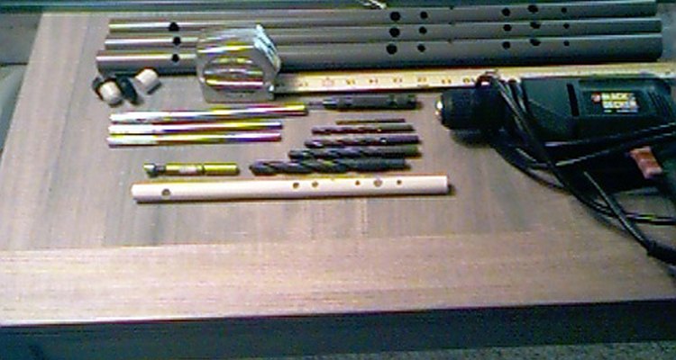 The raw materials and a finished PVC flute