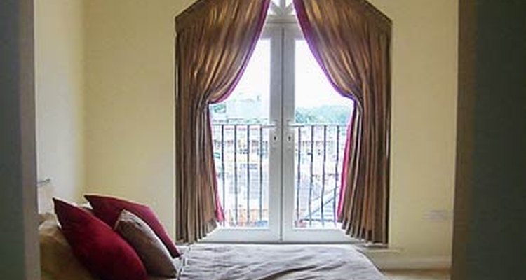 A window with a triangular head needs a special window treatment.