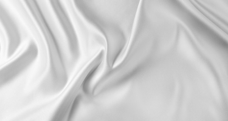 Clean yellowed silk at home to save money on dry-cleaning costs.