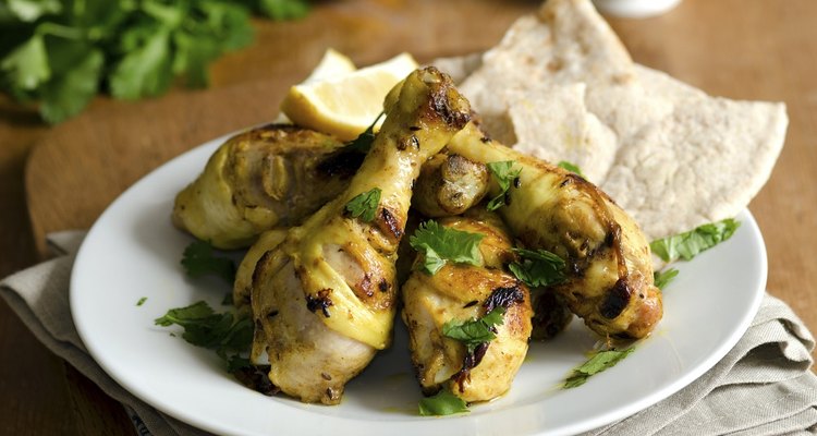 Prepare chicken drumsticks in the microwave to cook them quickly.