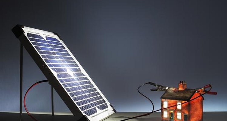 Photovoltaic panels (seen here placed on a roof) capture radiant energy from the sun and convert it into electricity.