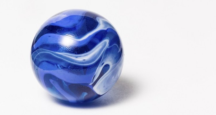 Use coloured fabric to give the styrofoam ball a distinctive look.