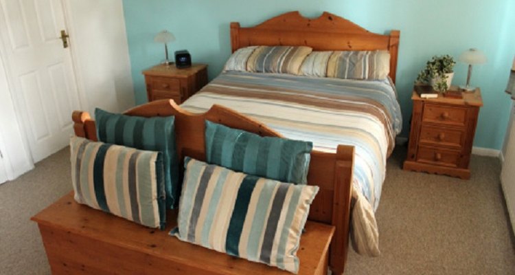 Double beds work well in guest bedrooms, especially with limited space.