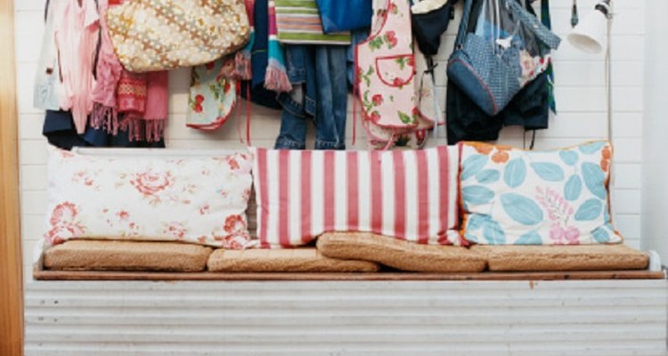 Keep all of your coats and bags in order with a hanging coat rack on your wall.