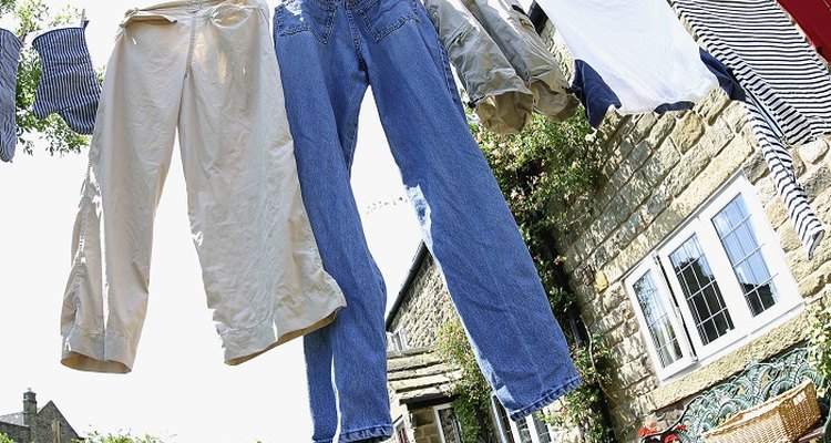 Hang dry-cleaned clothes on an outside washing line to remove musty odours.