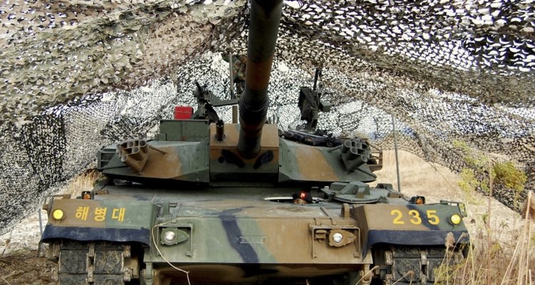 Custom made 1/35 scale camouflage netting can add realism to military models.