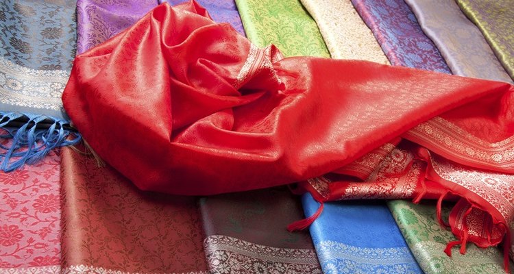 Stop satin from fraying immediately to prevent the fabric unravelling.
