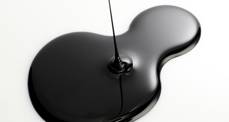 Oil stains on wood cause a greasy, discoloured spot on your table.
