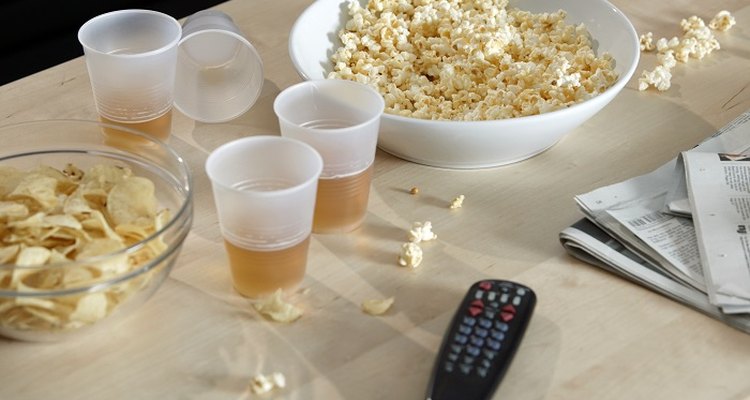 Cover your glass table with wood or another material.