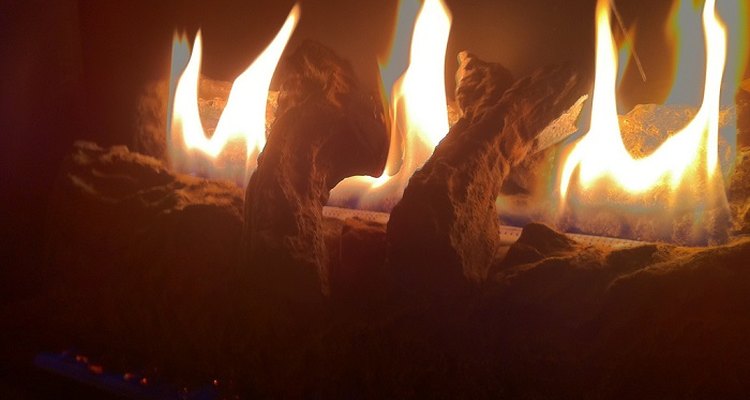 Create a fake fire with cellophane and a fan.