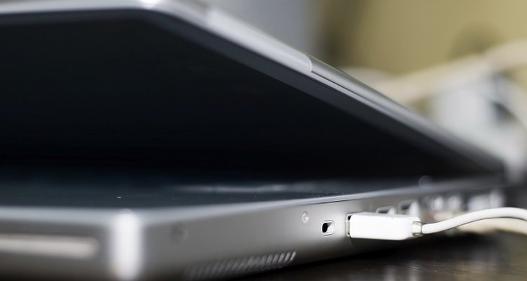 Buff the scratches out of your laptop's lid.
