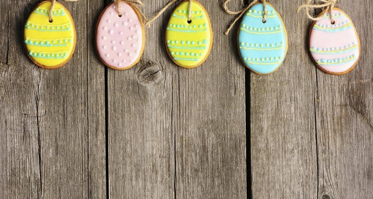 Painting eggs helps develop children's artistic abilities and fine motor skills.