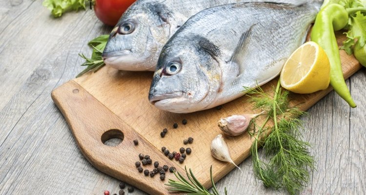 Adding lemons or herbs to fish can cover up a strong fishy taste.