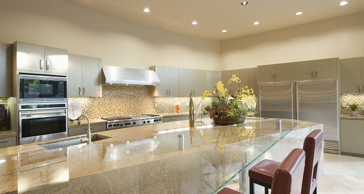 Lowering the breakfast bar to worktop height provides a comfortable compromise.
