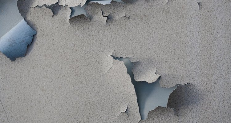 Flaky paint on interior walls is unsightly and prevents new paint from sticking properly.