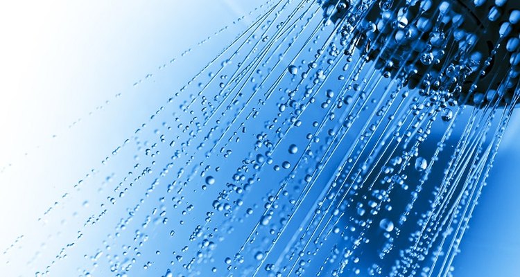 Get more water power from your shower by moving the flow restrictor.
