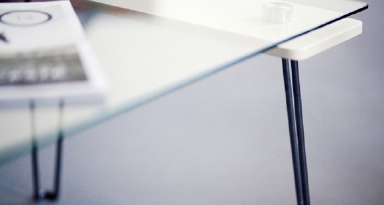 Glass tables have a sleeker appearance, but are also easier to damage than wooden ones.