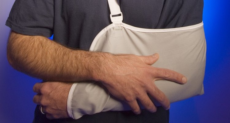 Make a simple triangle arm sling using a square or rectangular piece of cloth.