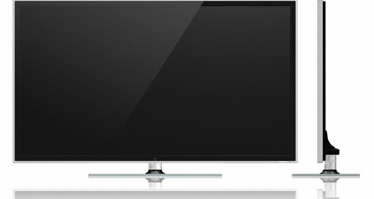 Removing the base of an LG LCD TV.