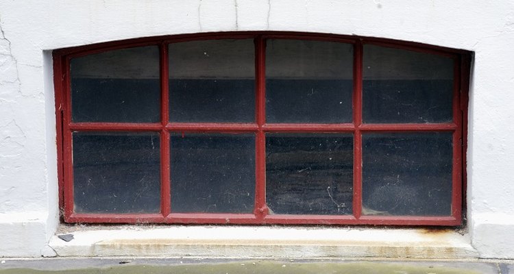 Basement and cellar windows in older properties are often set back into a window well.