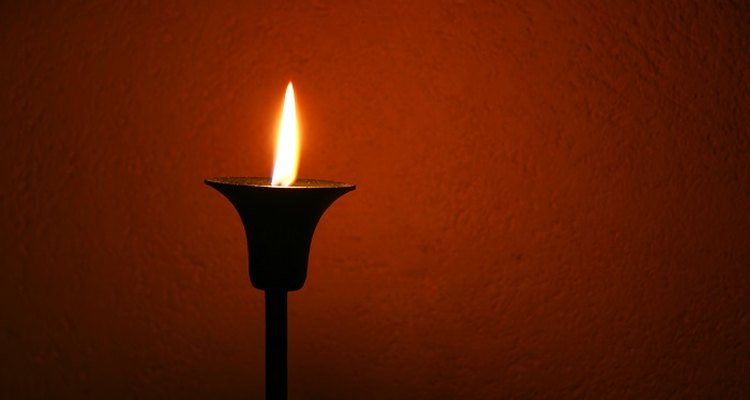 Remove candle soot from walls with soapy water.