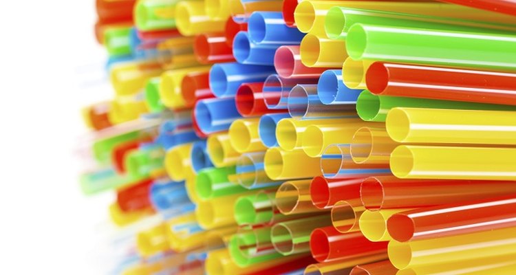 Use drinking straws to create a catapult.