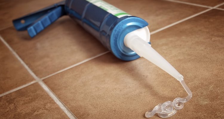 Whiten yellow silicone with a bleach-based cleaning solution.