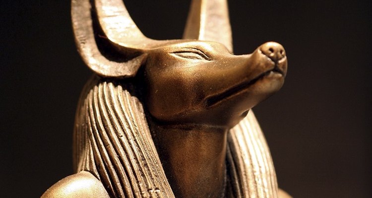 Create a mask resembling the jackal-headed Egyptian god Anubis.