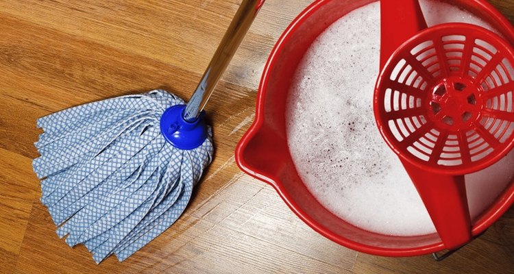 Repair marks on laminate floors by scrubbing with gentle cleaners.