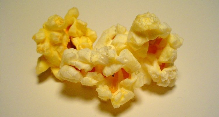 Deliciosas palomitas de maíz con condimento de queso cheddar.