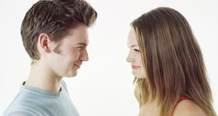Flirt with your friend by making direct eye contact.